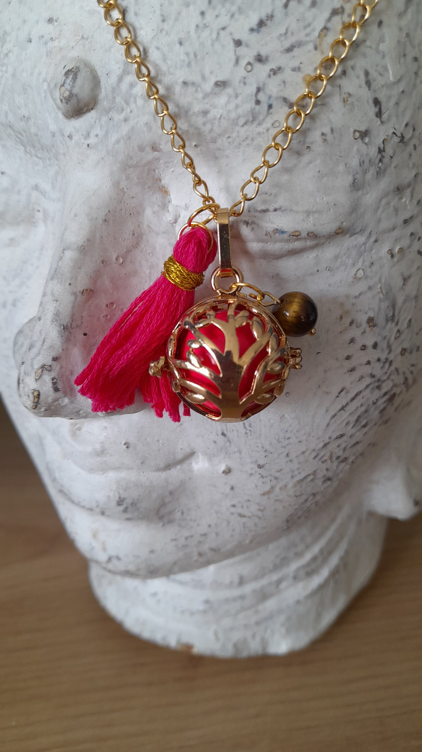 Bola de grossesse, oeil de tigre, pouvoir des pierres, pierre de gemme